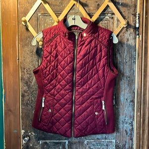 Striking cranberry vest with gold accents